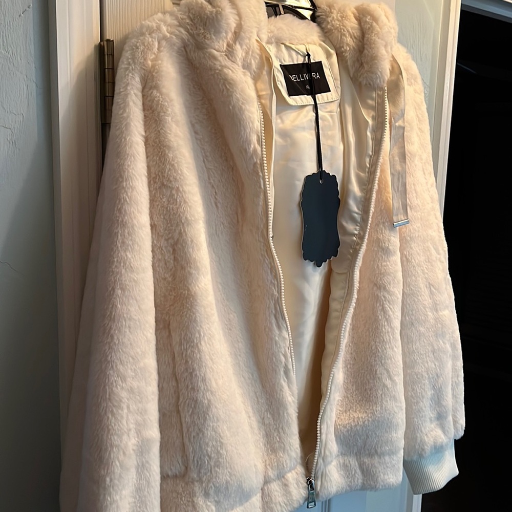 Soft hooded jacket, new with tag.